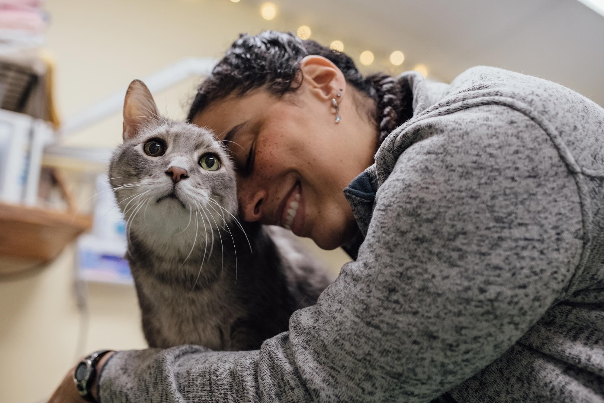 doctor snuggling cat