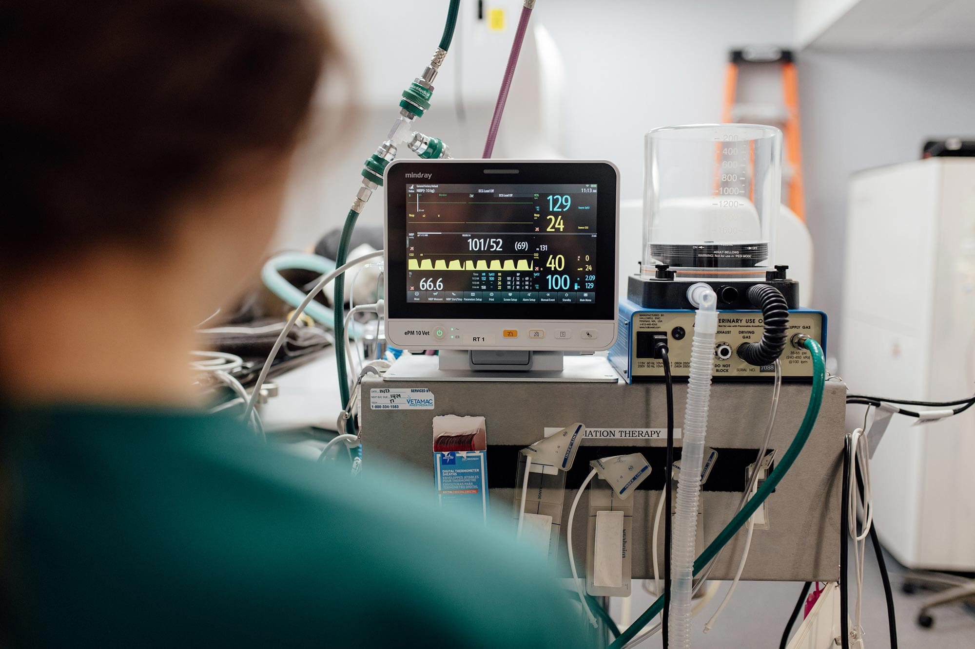 doctor monitoring vitals during radiation therapy